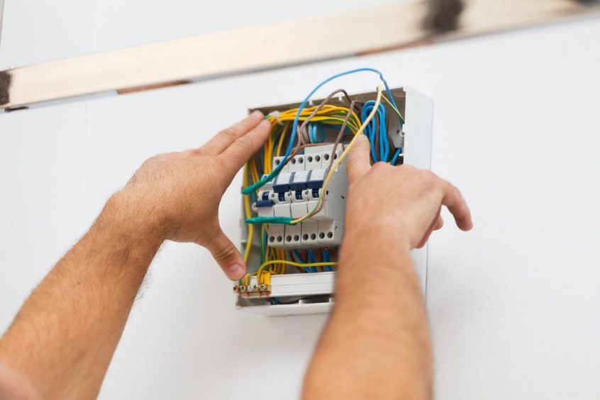 Electrician evaluating wires